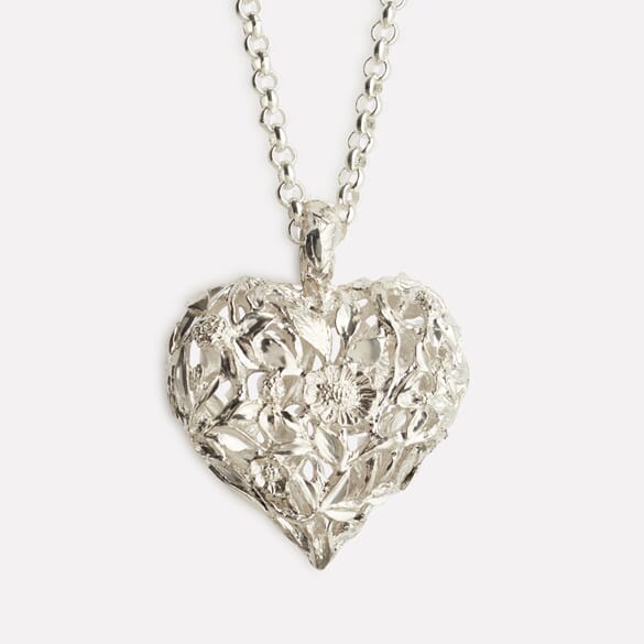 Red clover heart pendant in silver